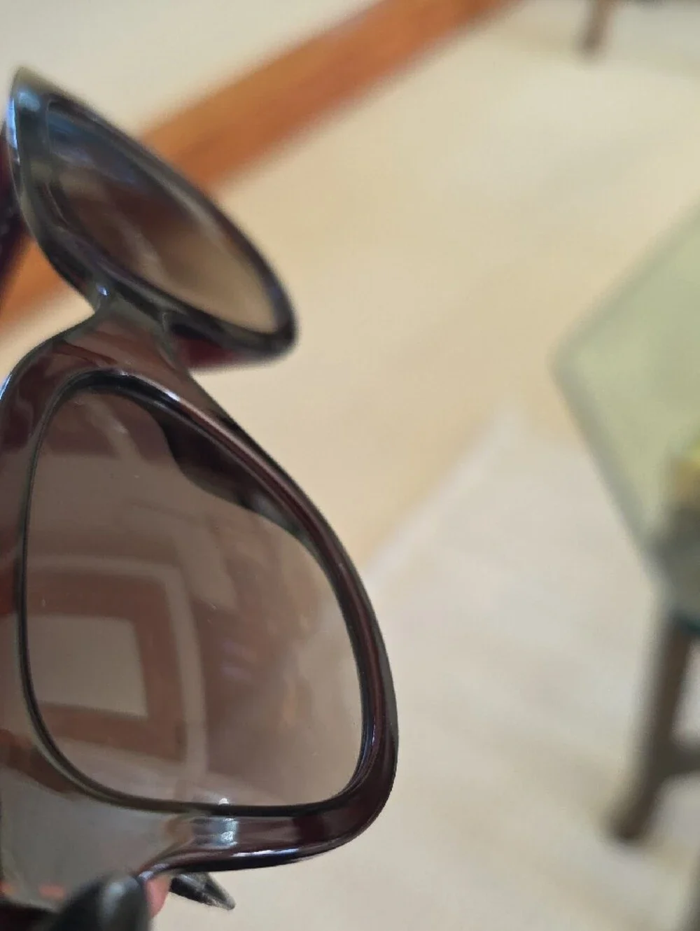 Salvatore Ferragamo SF1066S sunglasses feature a dark crystal brown frame